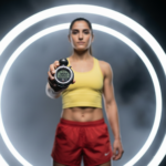 Riley Via holding a stopwatch