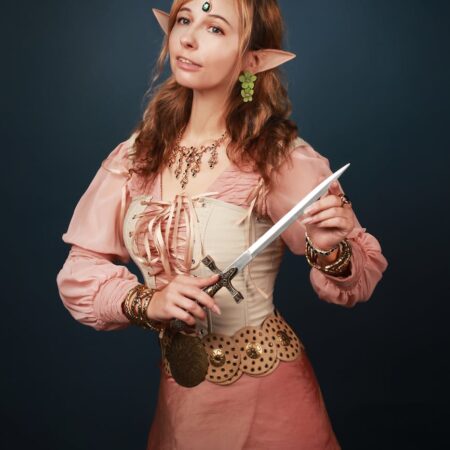 a woman in fairy costume having a photoshoot